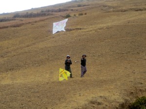 Kids playing with kites on Amantani Island