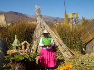 President of the Uros Floating Islands teaching us about her culture.