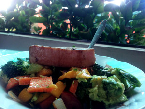 Tuna steak atop a yummy salad in my apartment...