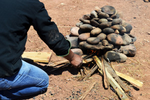 Step 3: Heat the stone dome for 45-60 minutes. These stones will then be used for heating the food. 